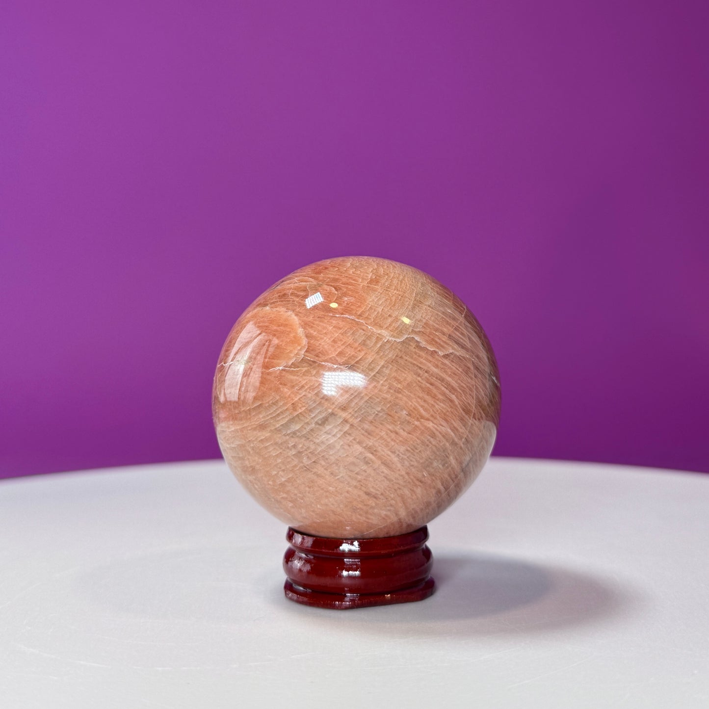 Peach Moonstone Sphere (Includes Wood Stand)