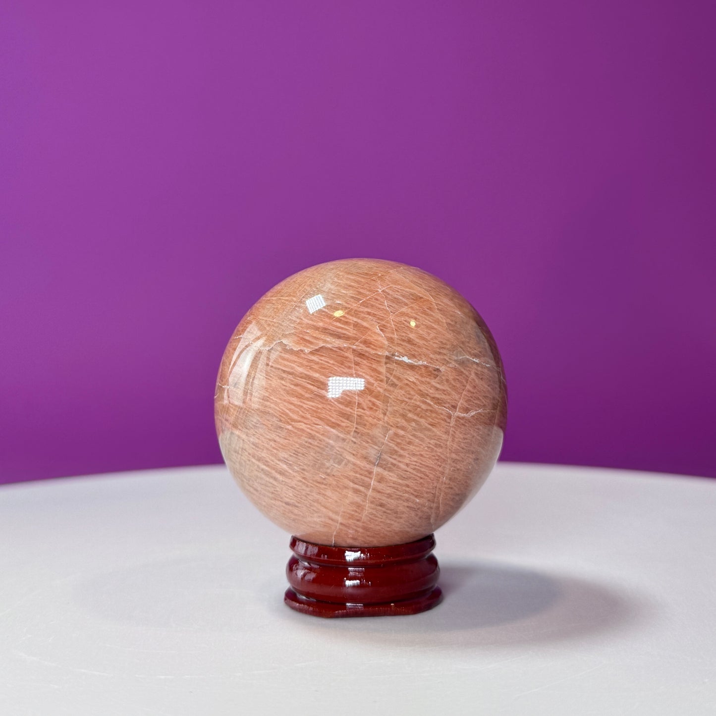 Peach Moonstone Sphere (Includes Wood Stand)