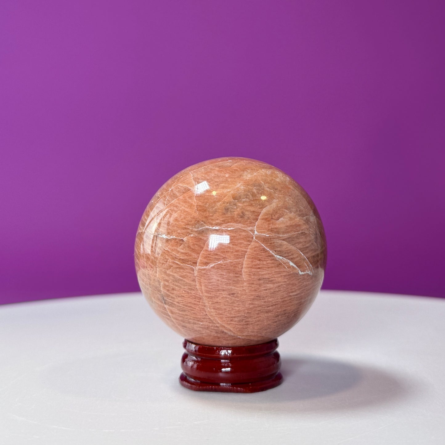 Peach Moonstone Sphere (Includes Wood Stand)