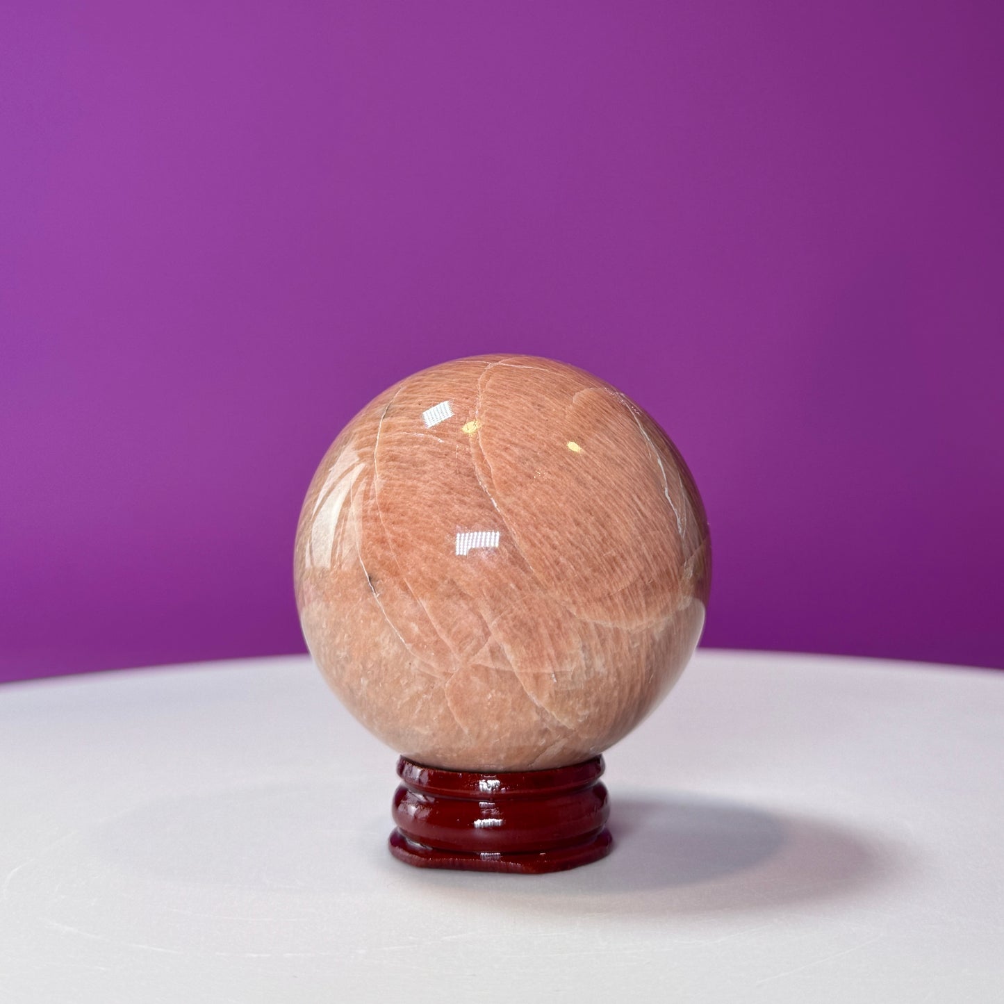 Peach Moonstone Sphere (Includes Wood Stand)