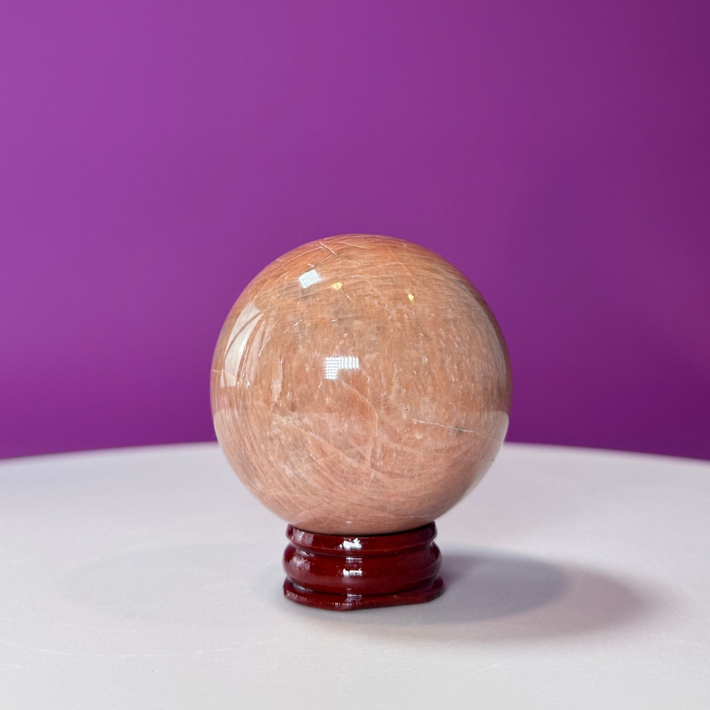 Peach Moonstone Sphere (Includes Wood Stand)