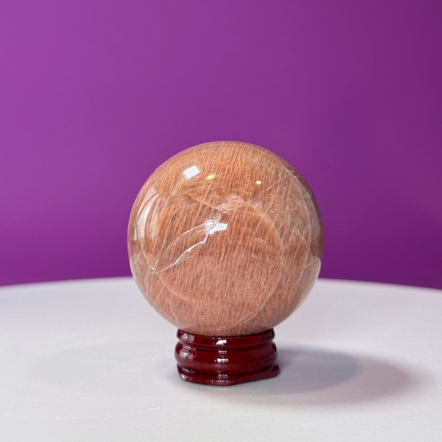 Peach Moonstone Sphere (Includes Wood Stand)