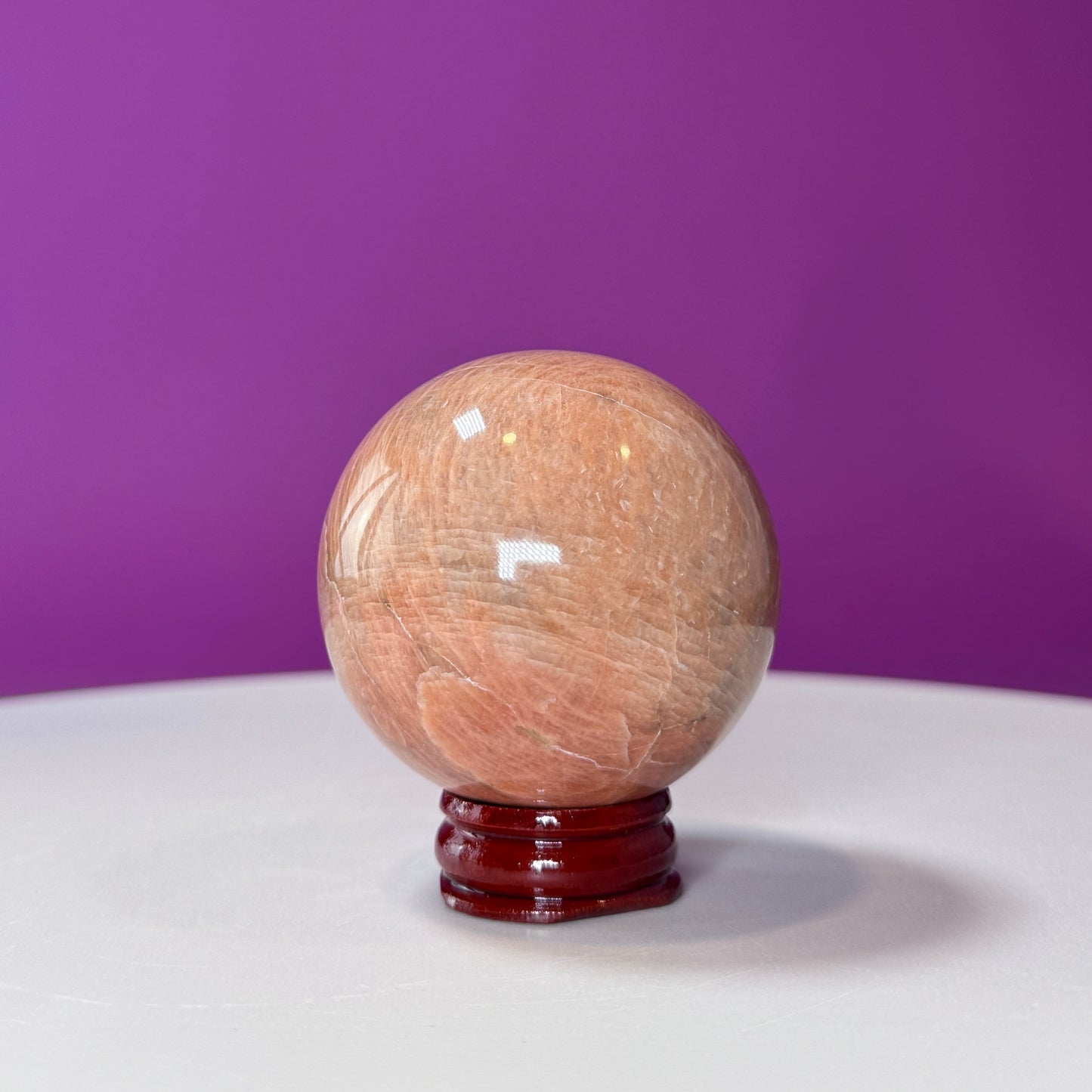 Peach Moonstone Sphere (Includes Wood Stand)