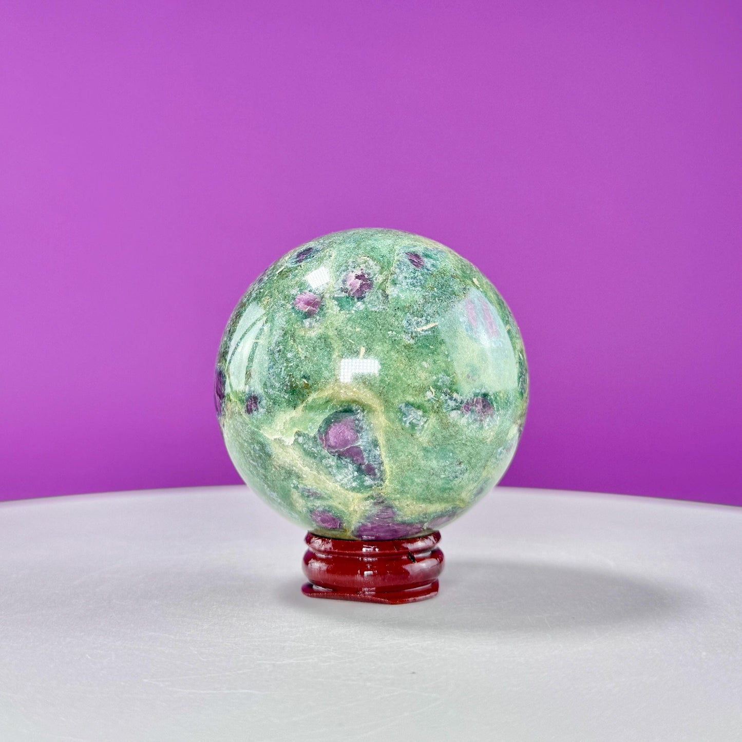 Ruby Fuchsite Sphere (Includes Wood Stand), UV Reactive