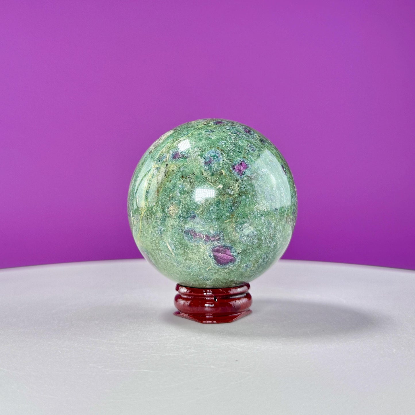 Ruby Fuchsite Sphere (Includes Wood Stand), UV Reactive
