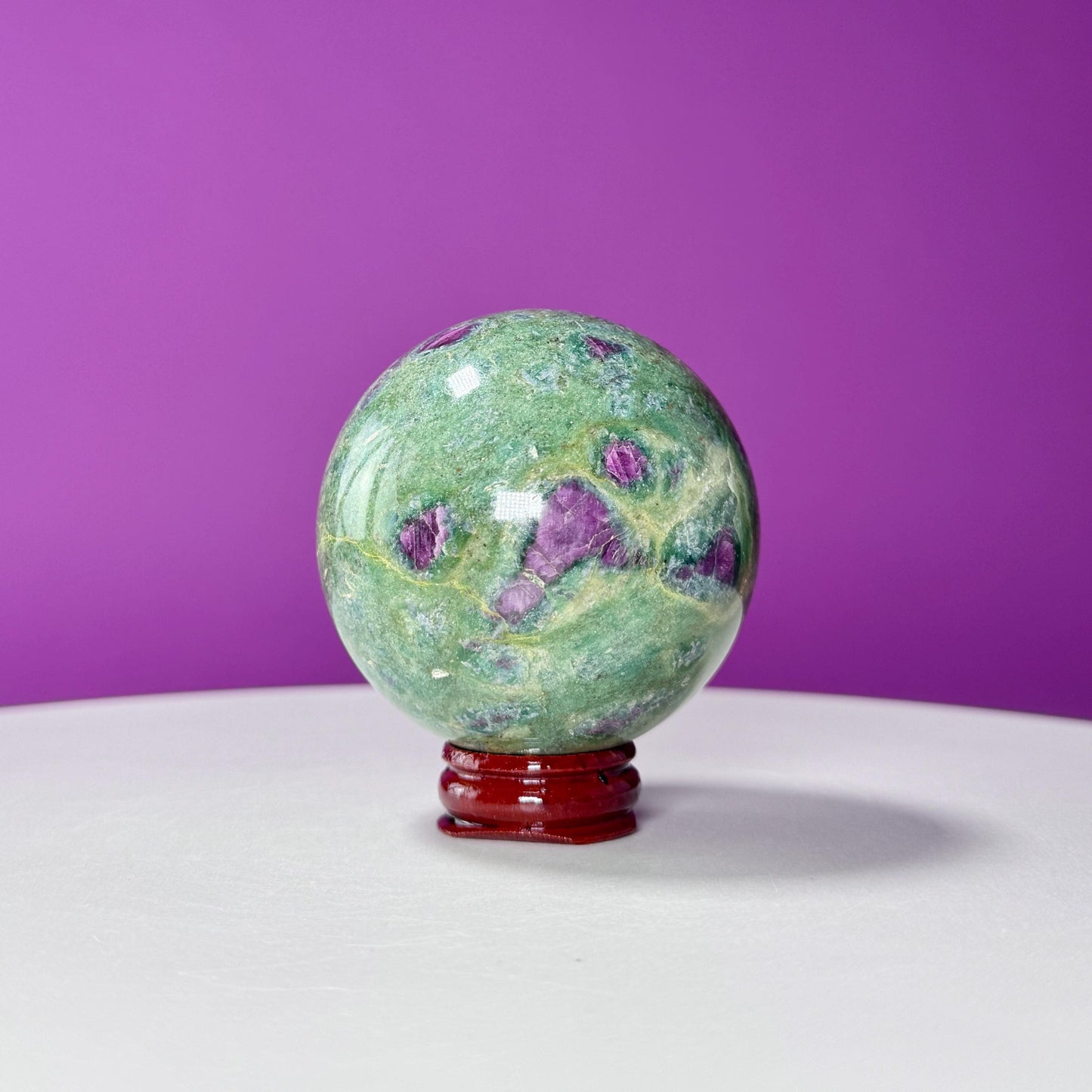 Ruby Fuchsite Sphere (Includes Wood Stand), UV Reactive