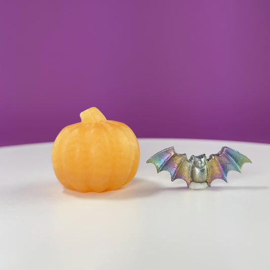 Orange Calcite Pumpkin and Aura Bismuth Bat Carvings