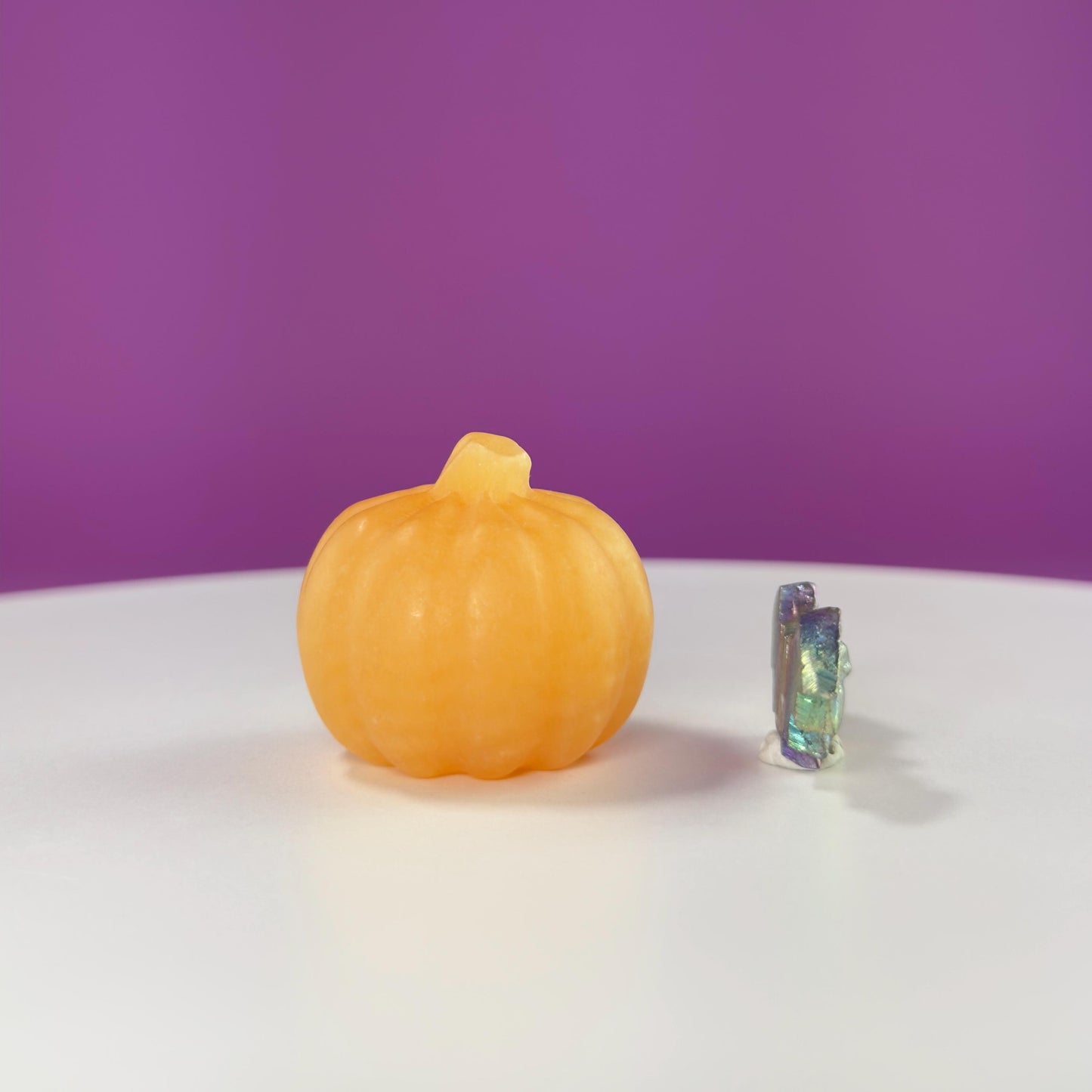 Orange Calcite Pumpkin and Aura Bismuth Bat Carvings