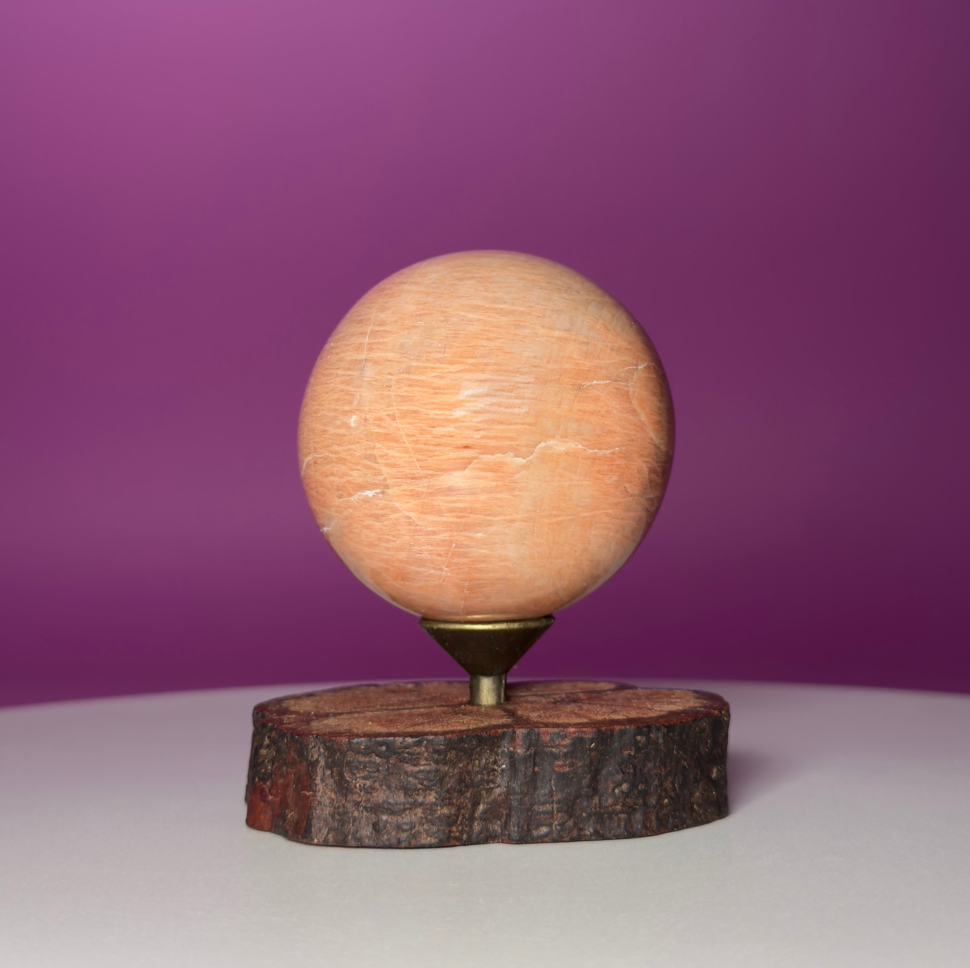 Peach Moonstone Sphere on Decorative Wood Stand