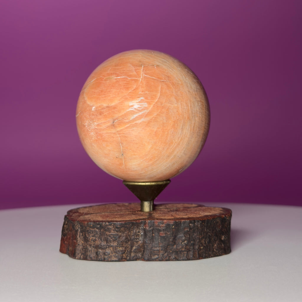 Peach Moonstone Sphere on Decorative Wood Stand