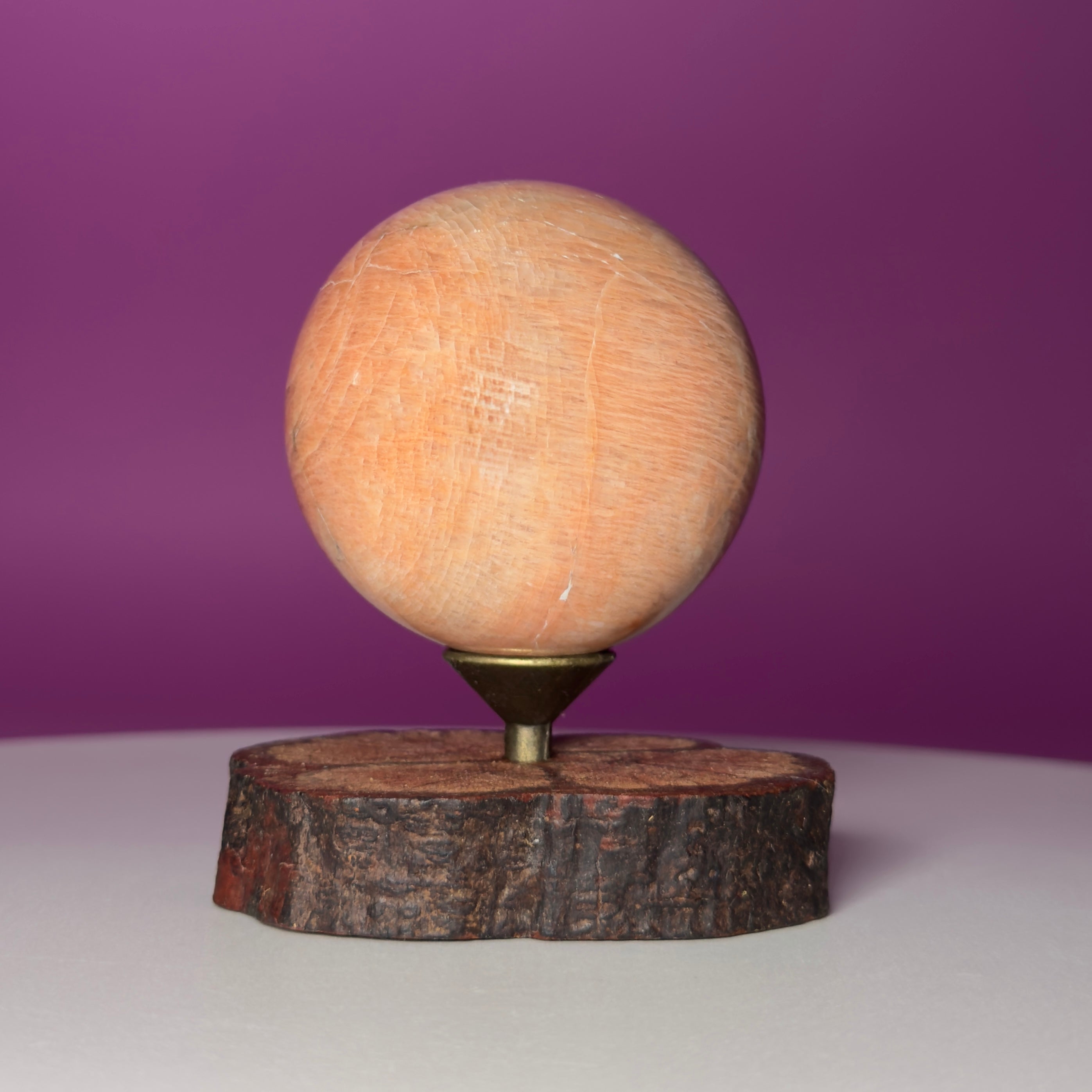 Peach Moonstone Sphere on Decorative Wood Stand