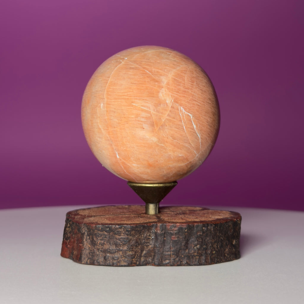 Peach Moonstone Sphere on Decorative Wood Stand