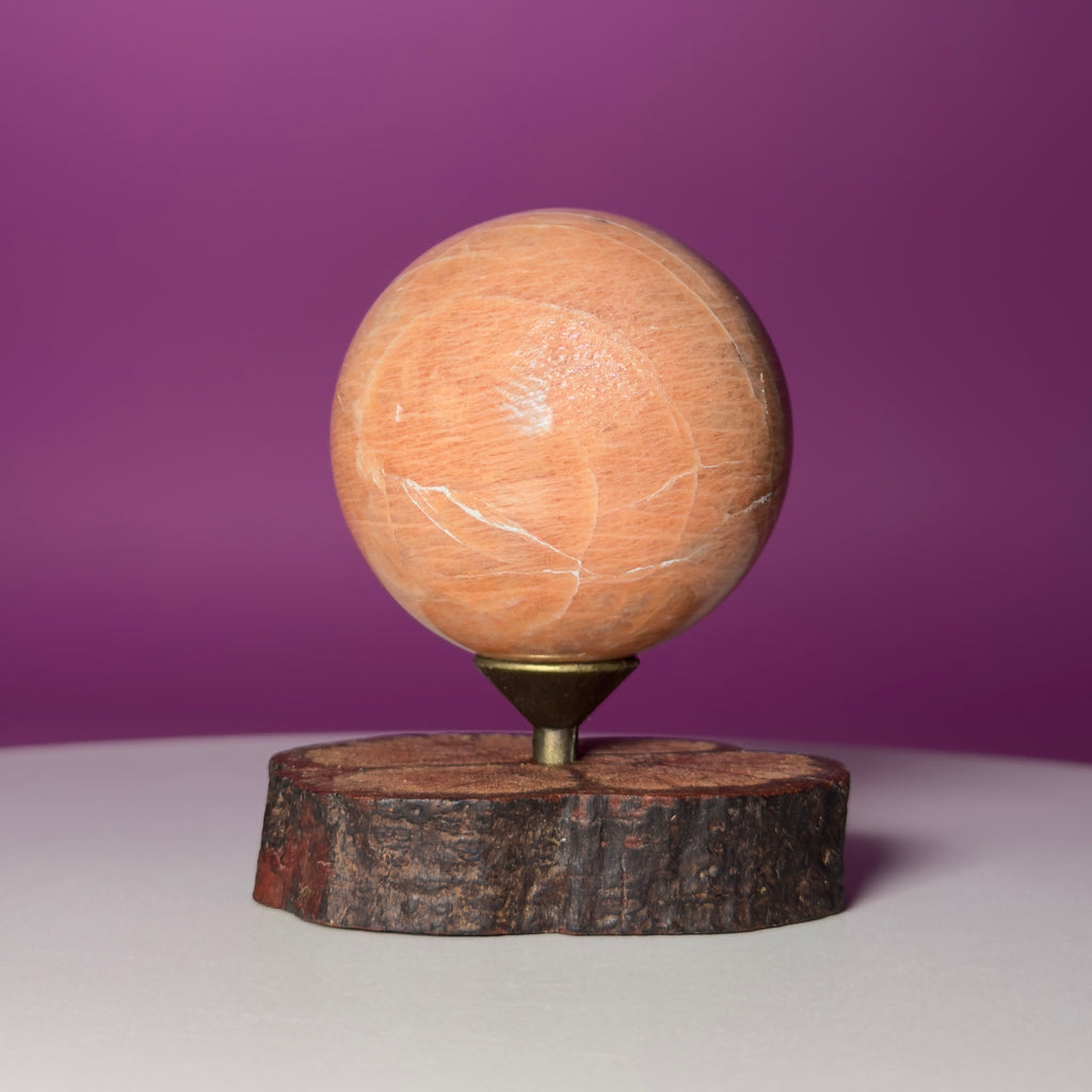 Peach Moonstone Sphere on Decorative Wood Stand