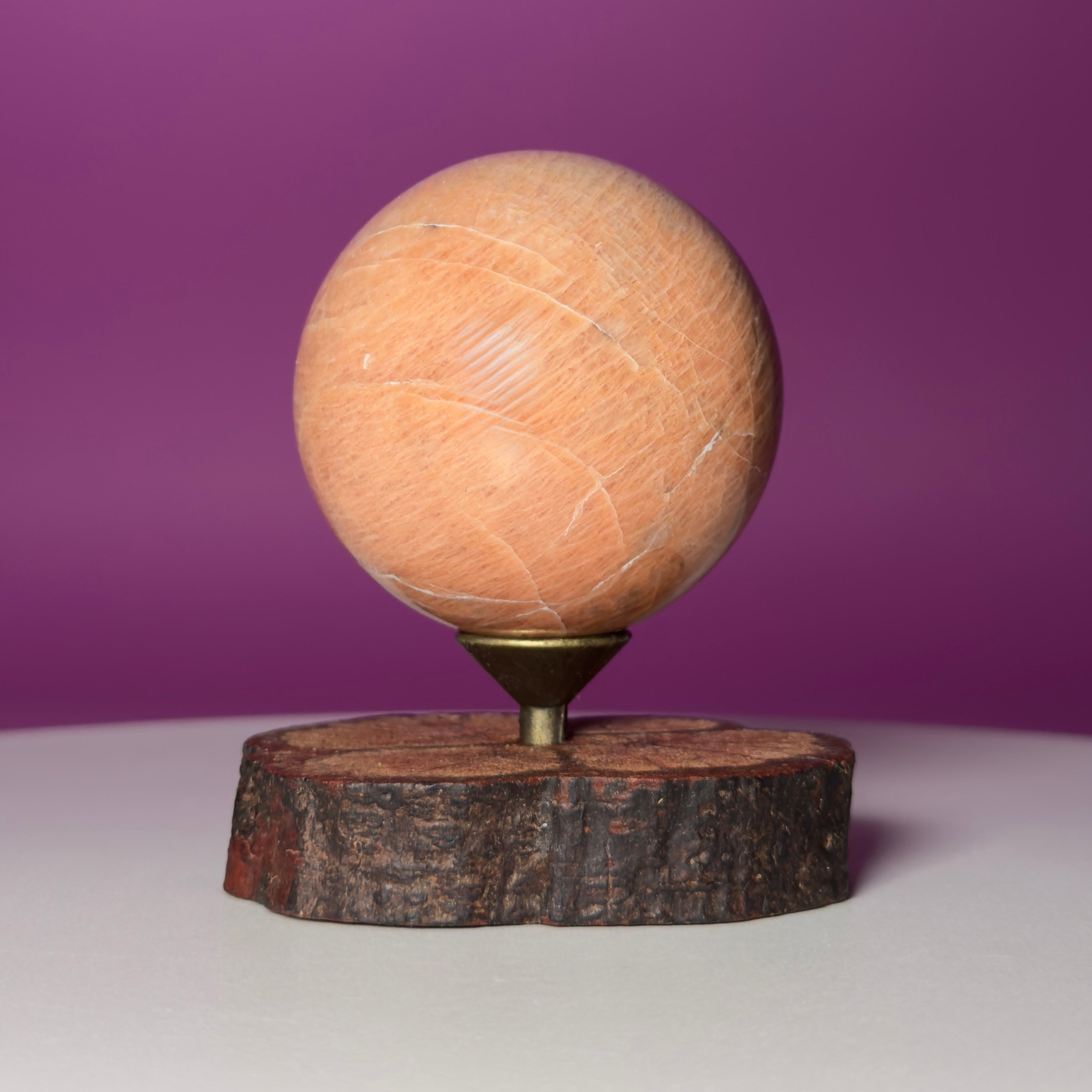 Peach Moonstone Sphere on Decorative Wood Stand
