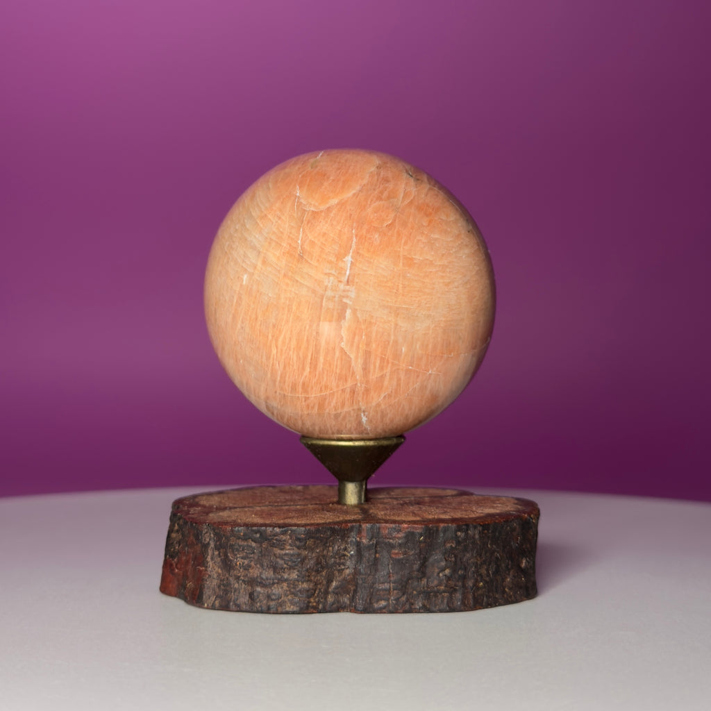 Peach Moonstone Sphere on Decorative Wood Stand