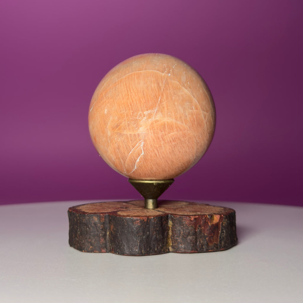 Peach Moonstone Sphere on Decorative Wood Stand