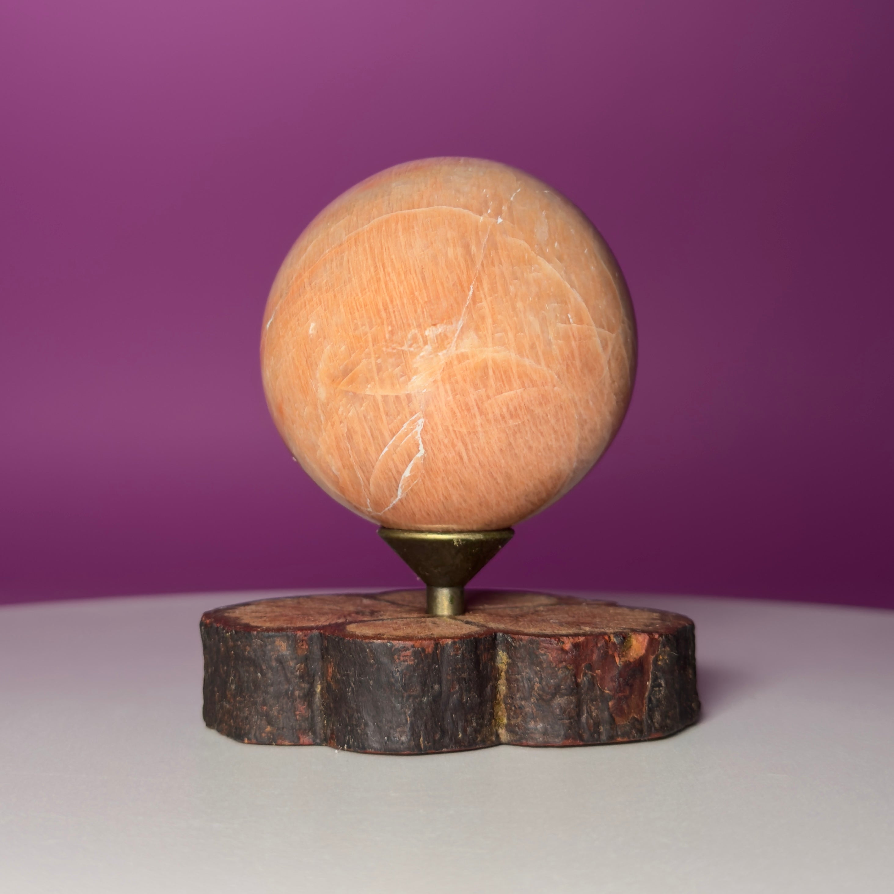 Peach Moonstone Sphere on Decorative Wood Stand