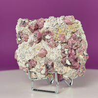 Pink Garnet Specimen from Mexico with Silver Stand
