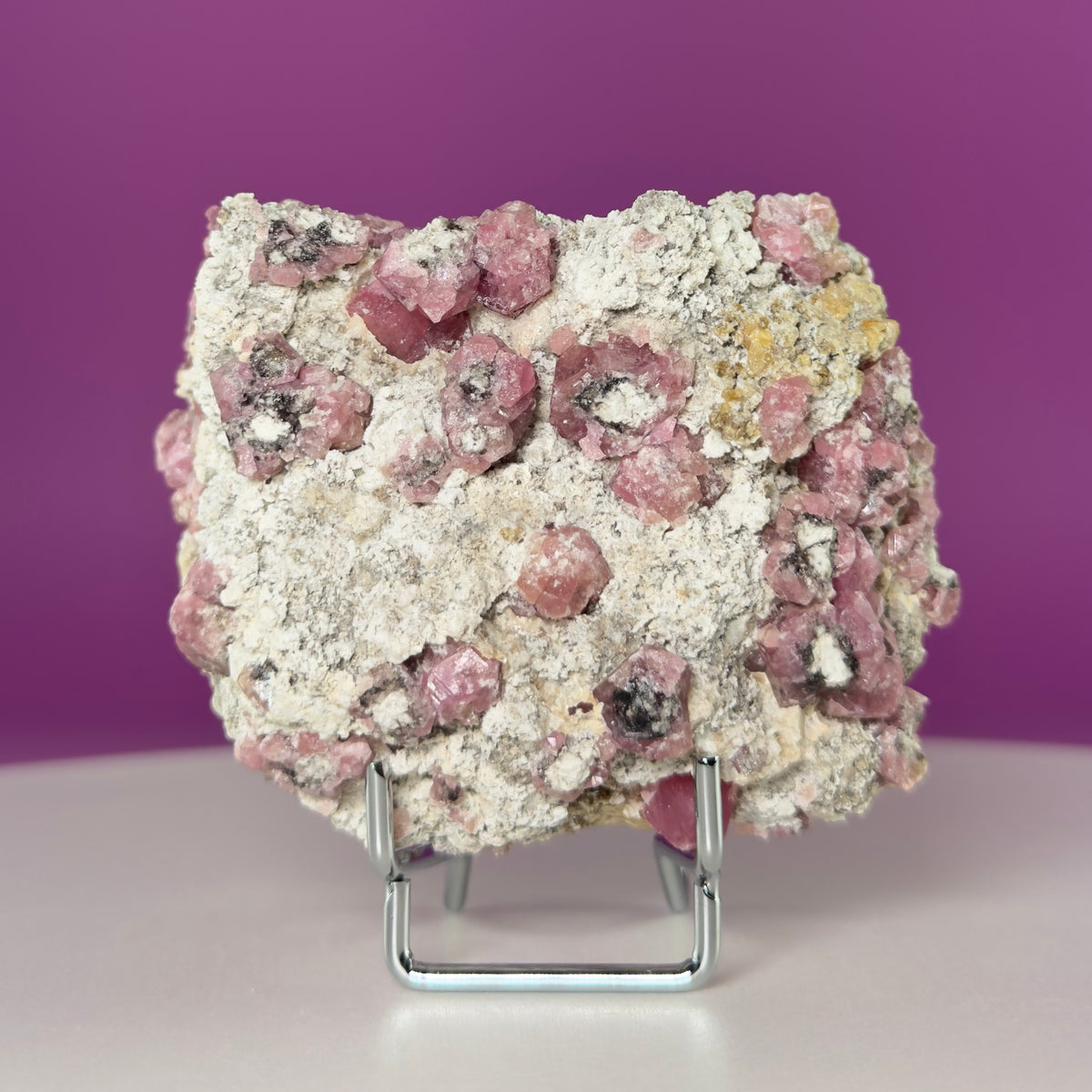 Pink Garnet Specimen from Mexico with Silver Stand