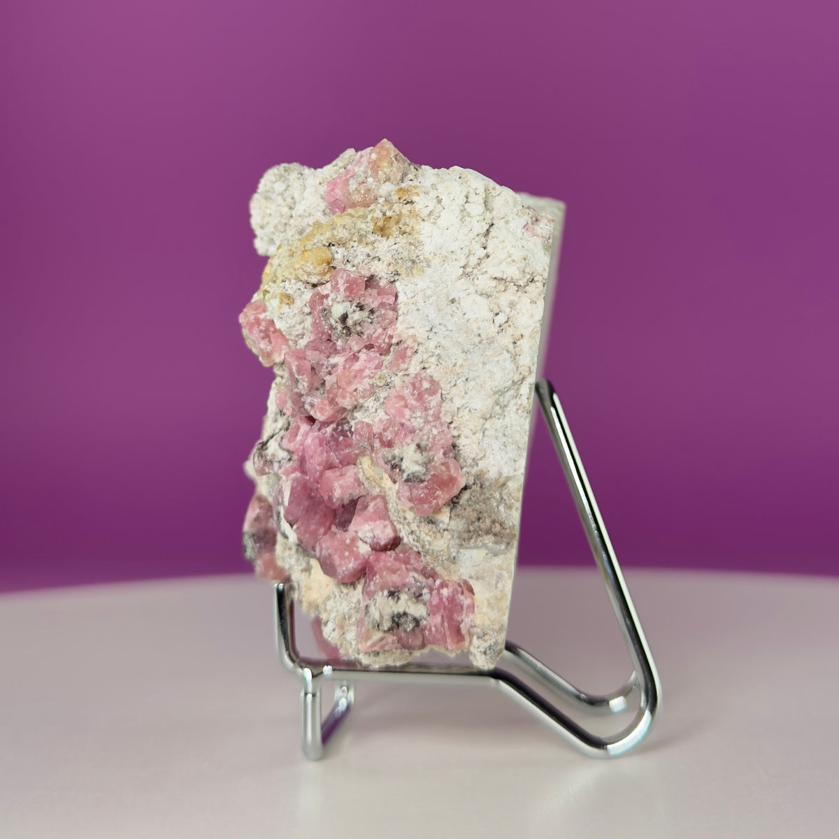 Pink Garnet Specimen from Mexico with Silver Stand