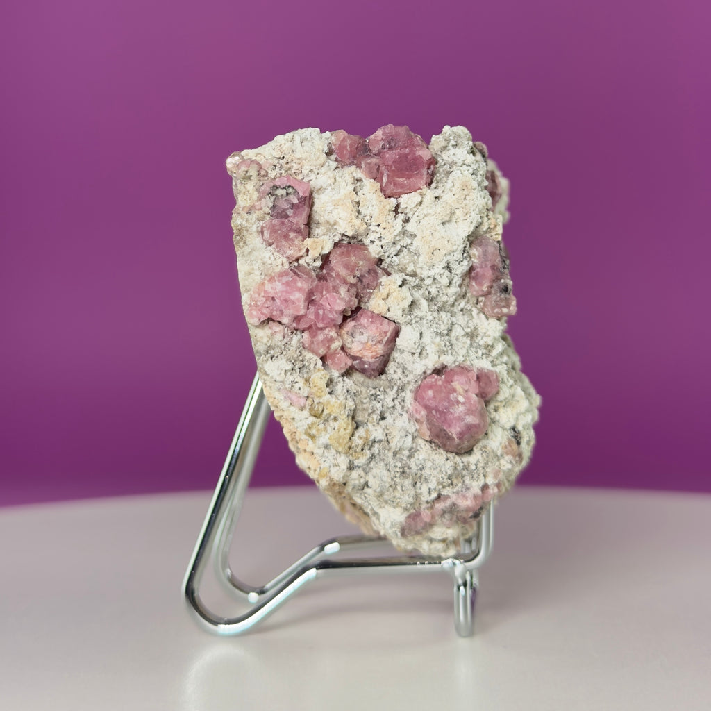 Pink Garnet Specimen from Mexico with Silver Stand