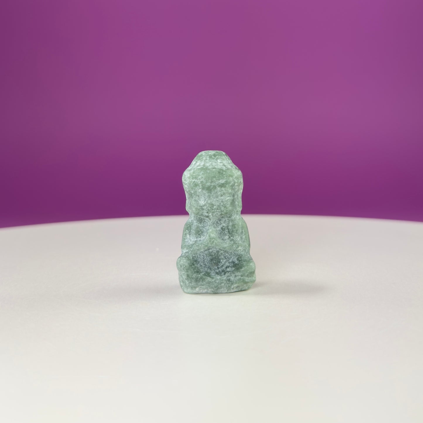 Crystal Baby Buddha Carving: Pocket-Sized Meditation Stone