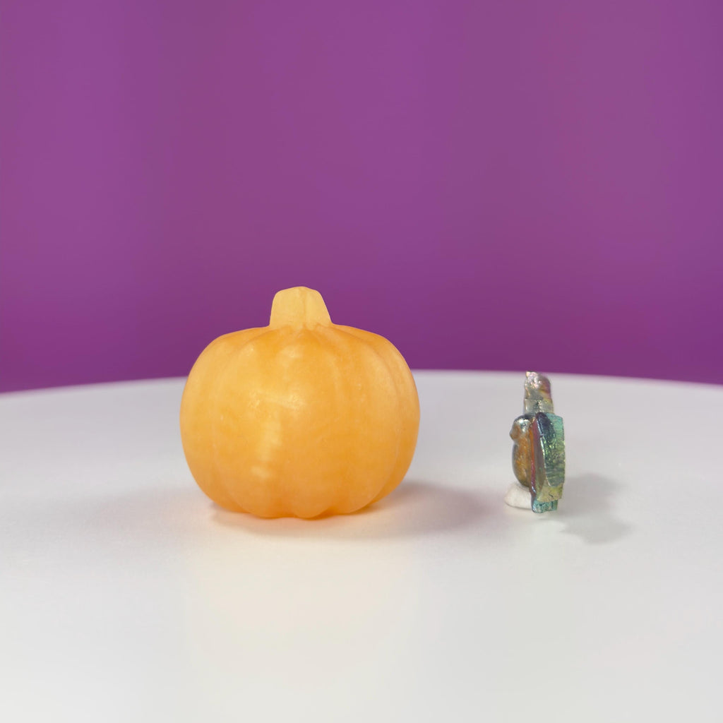 Orange Calcite Pumpkin and Aura Bismuth Bat Carvings