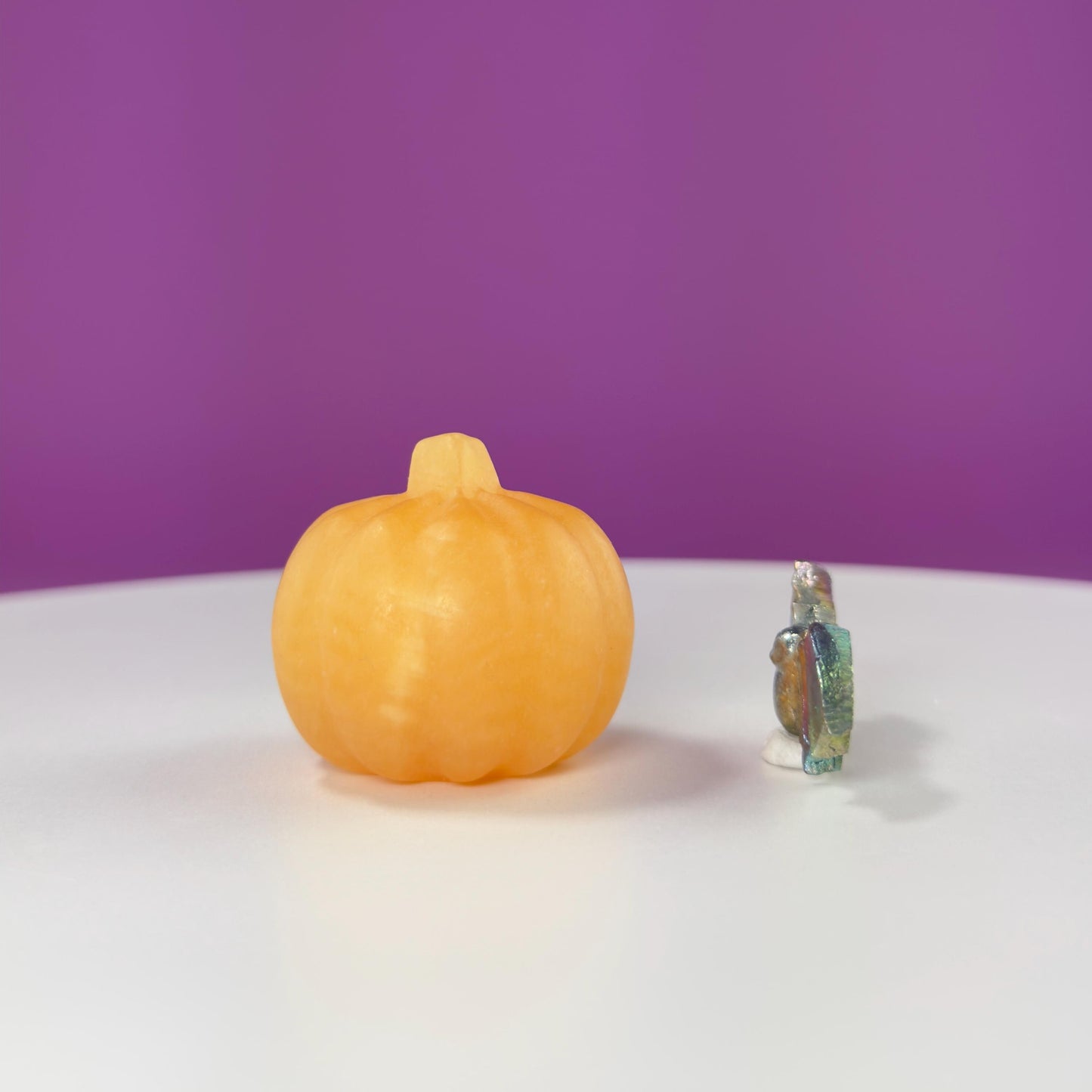Orange Calcite Pumpkin and Aura Bismuth Bat Carvings