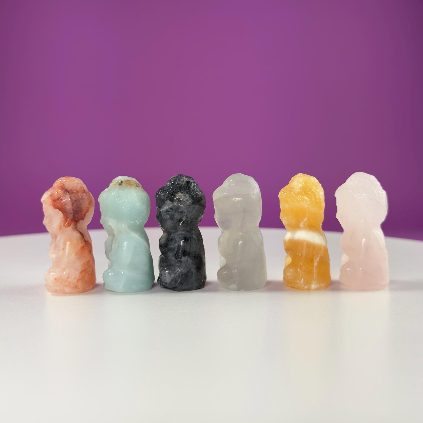 Crystal Baby Buddha Carving: Pocket-Sized Meditation Stone