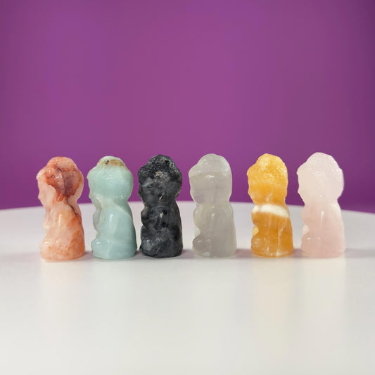 Crystal Baby Buddha Carving: Pocket-Sized Meditation Stone