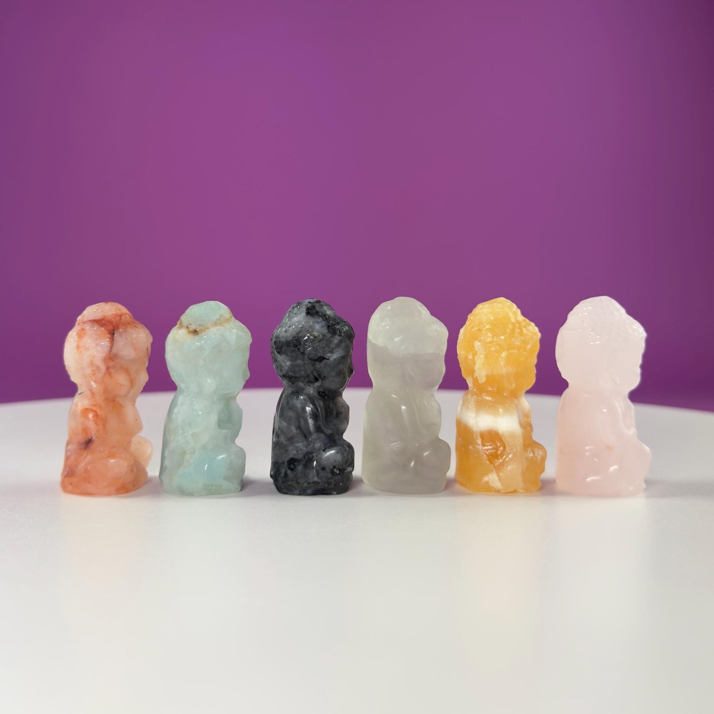 Crystal Baby Buddha Carving: Pocket-Sized Meditation Stone