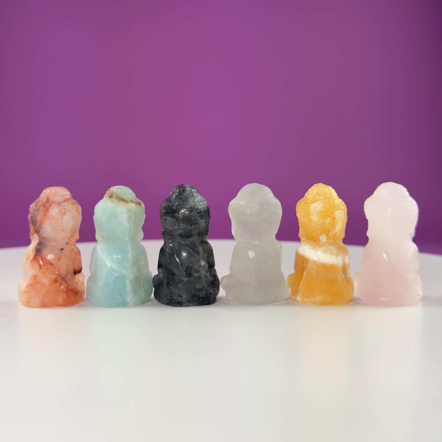 Crystal Baby Buddha Carving: Pocket-Sized Meditation Stone