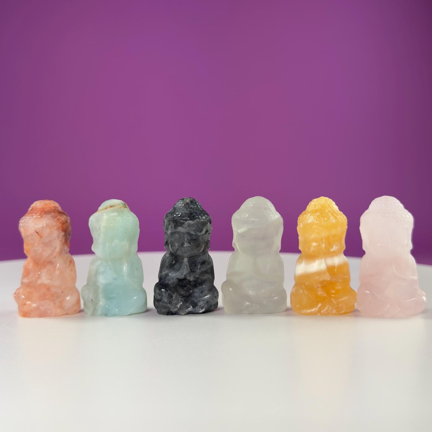 Crystal Baby Buddha Carving: Pocket-Sized Meditation Stone