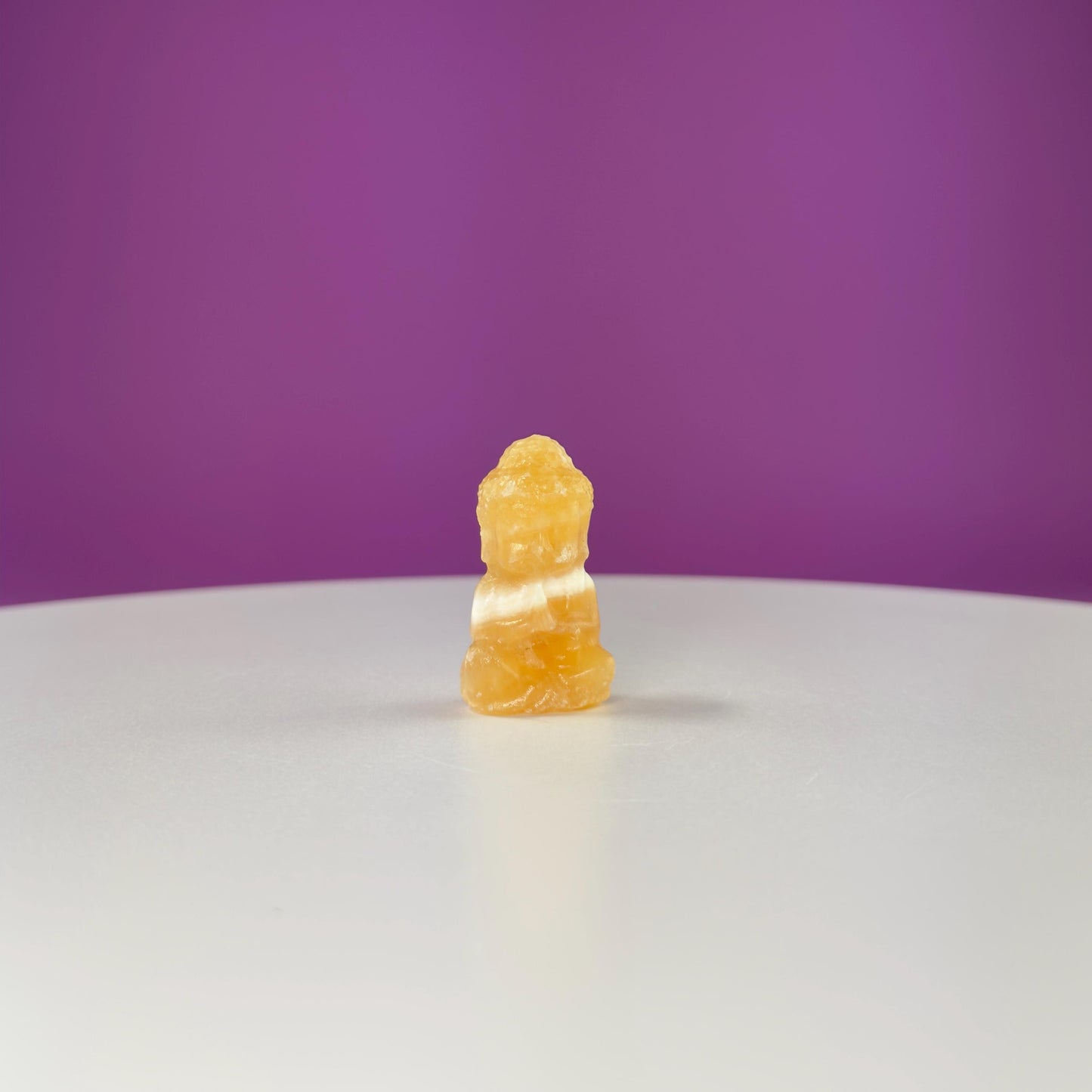 Crystal Baby Buddha Carving: Pocket-Sized Meditation Stone