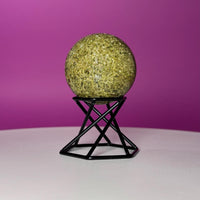 Green Tourmaline Sphere with Black Metal Stand – Protection & Grounding Crystal