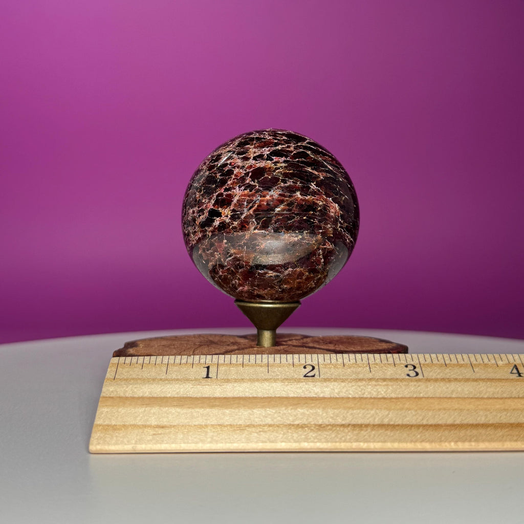 Garnet Sphere with Decorative Wood Stand – Grounding, Vitality & Strength