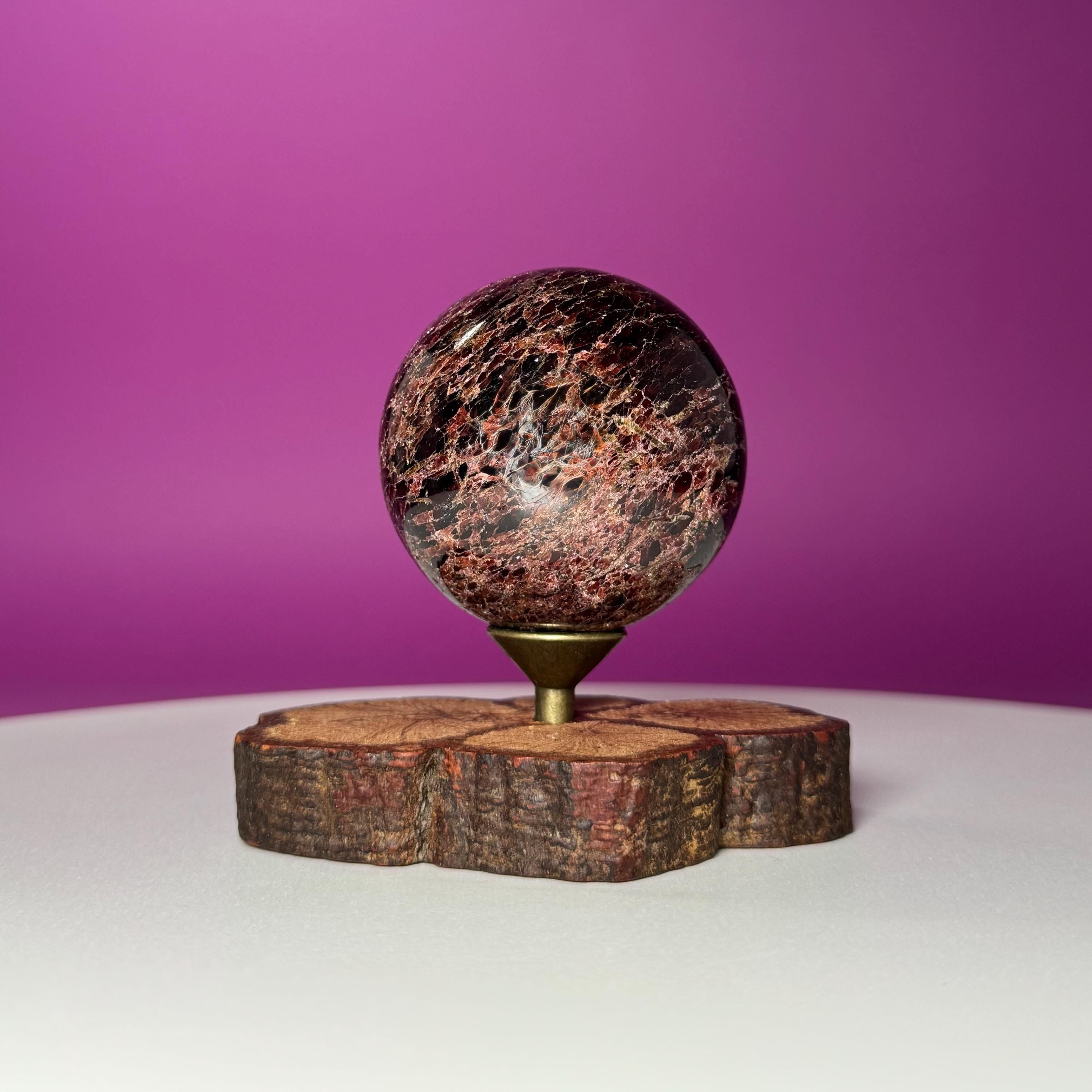 Garnet Sphere with Decorative Wood Stand – Grounding, Vitality & Strength