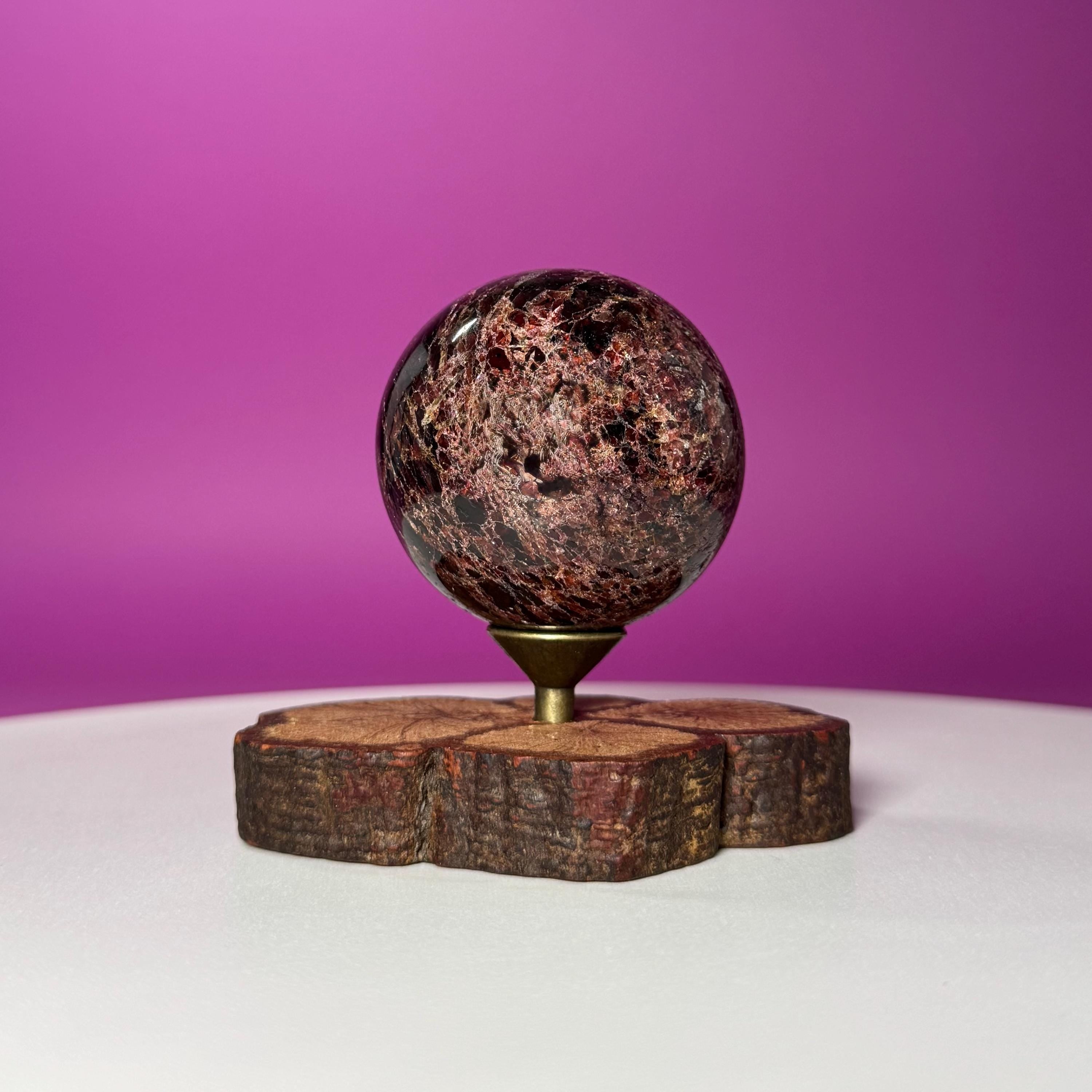 Garnet Sphere with Decorative Wood Stand – Grounding, Vitality & Strength
