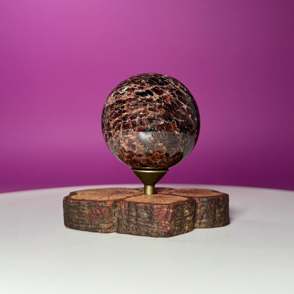 Garnet Sphere with Decorative Wood Stand – Grounding, Vitality & Strength