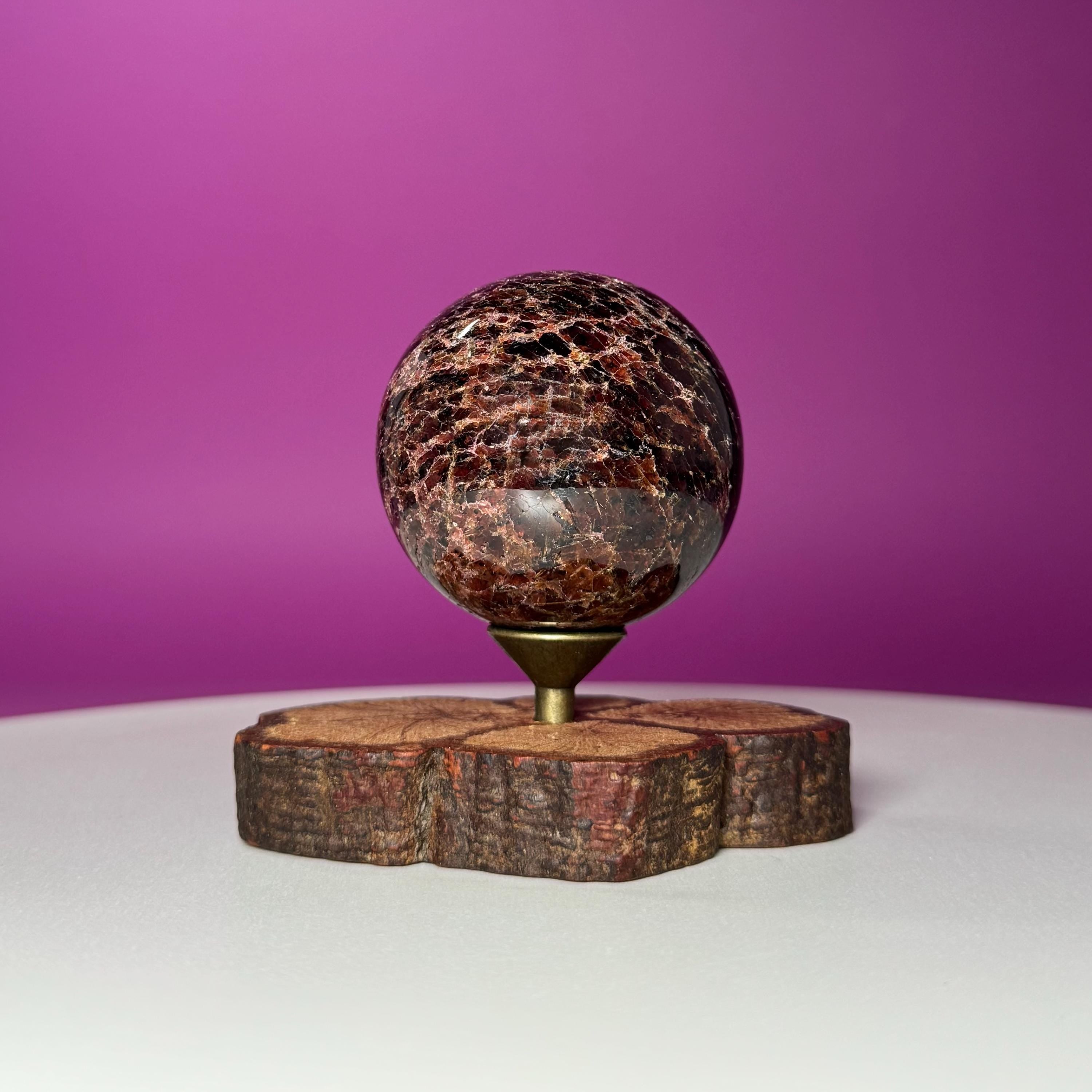Garnet Sphere with Decorative Wood Stand – Grounding, Vitality & Strength