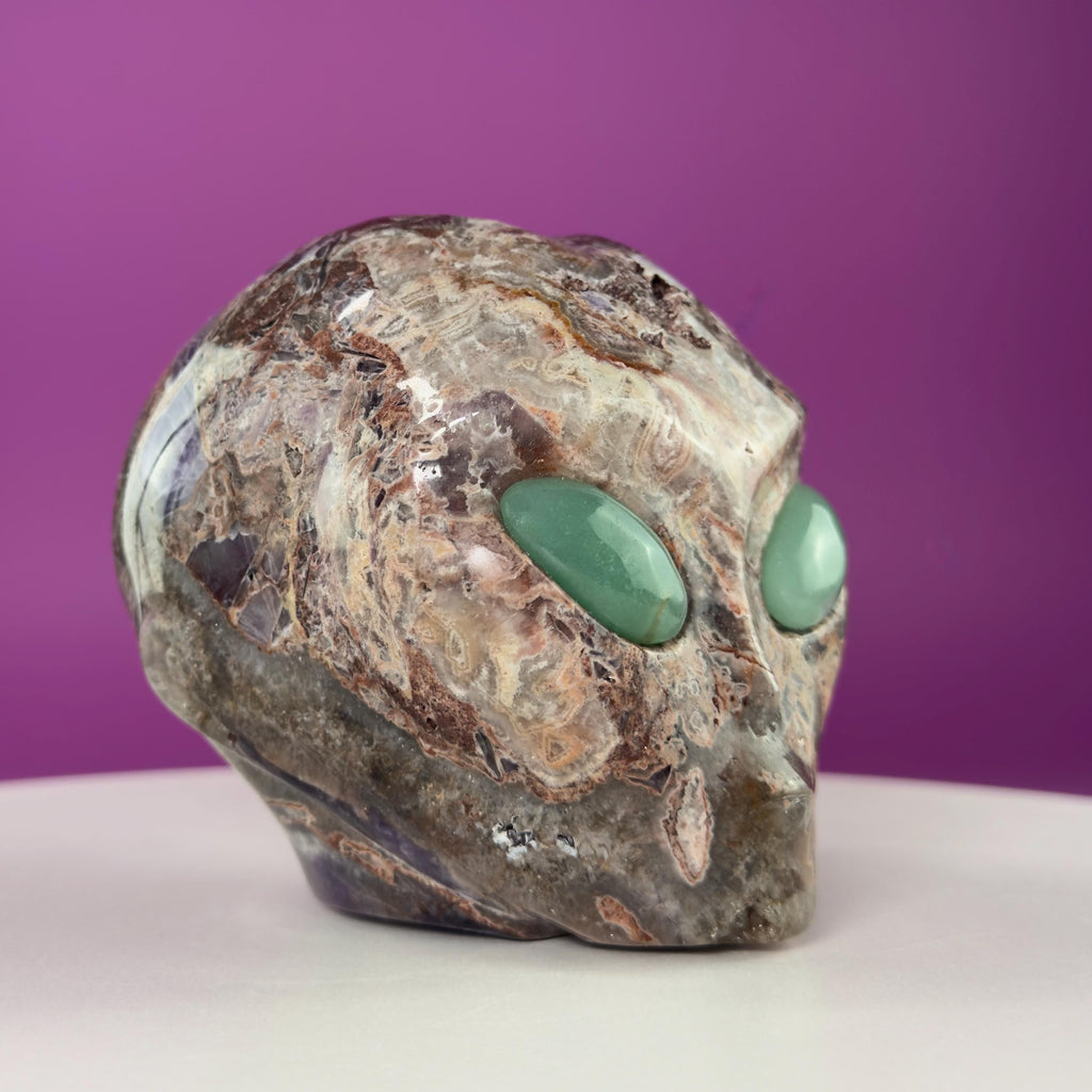 Amethyst Agate Alien Skull with Green Aventurine Eyes Crystal Carving