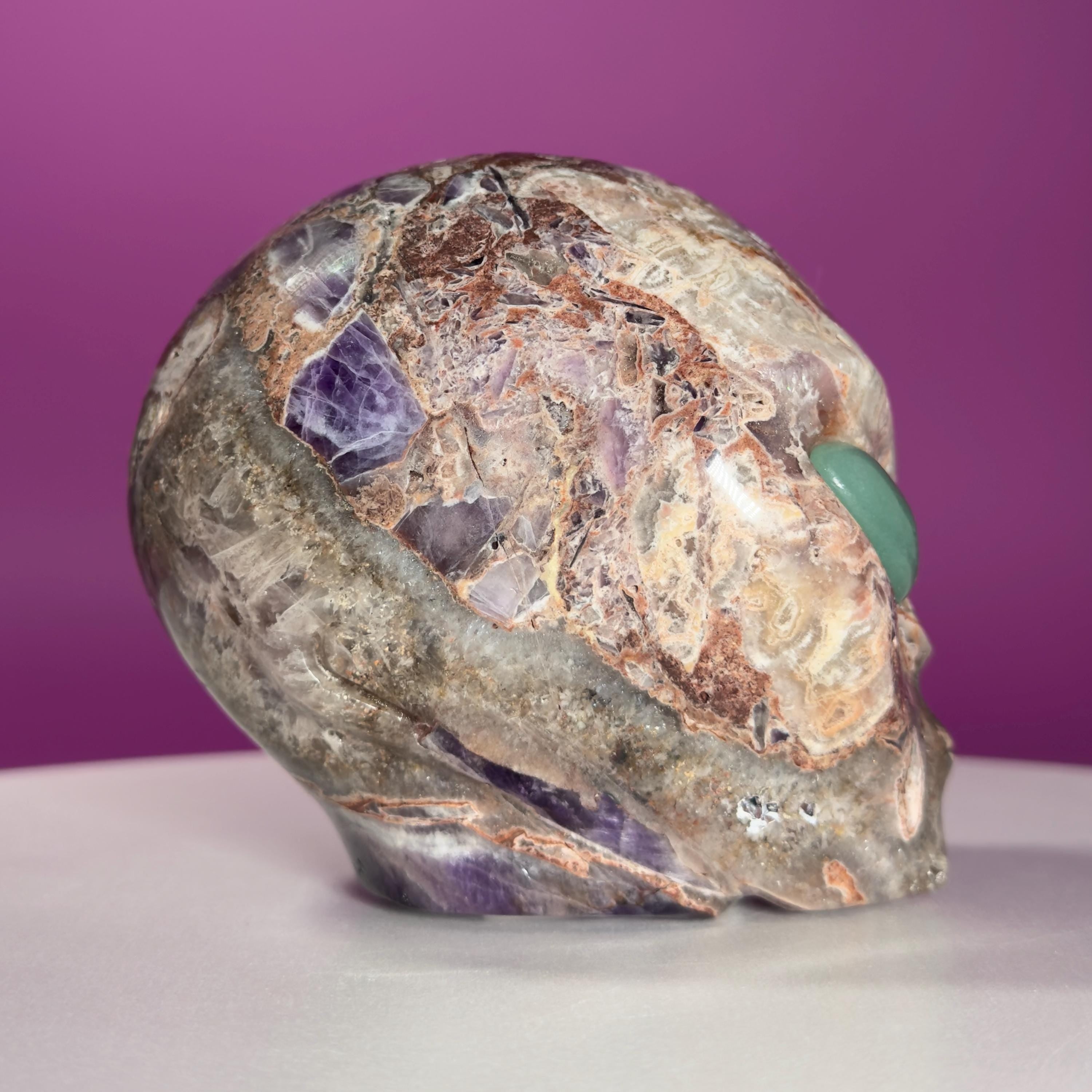 Amethyst Agate Alien Skull with Green Aventurine Eyes Crystal Carving