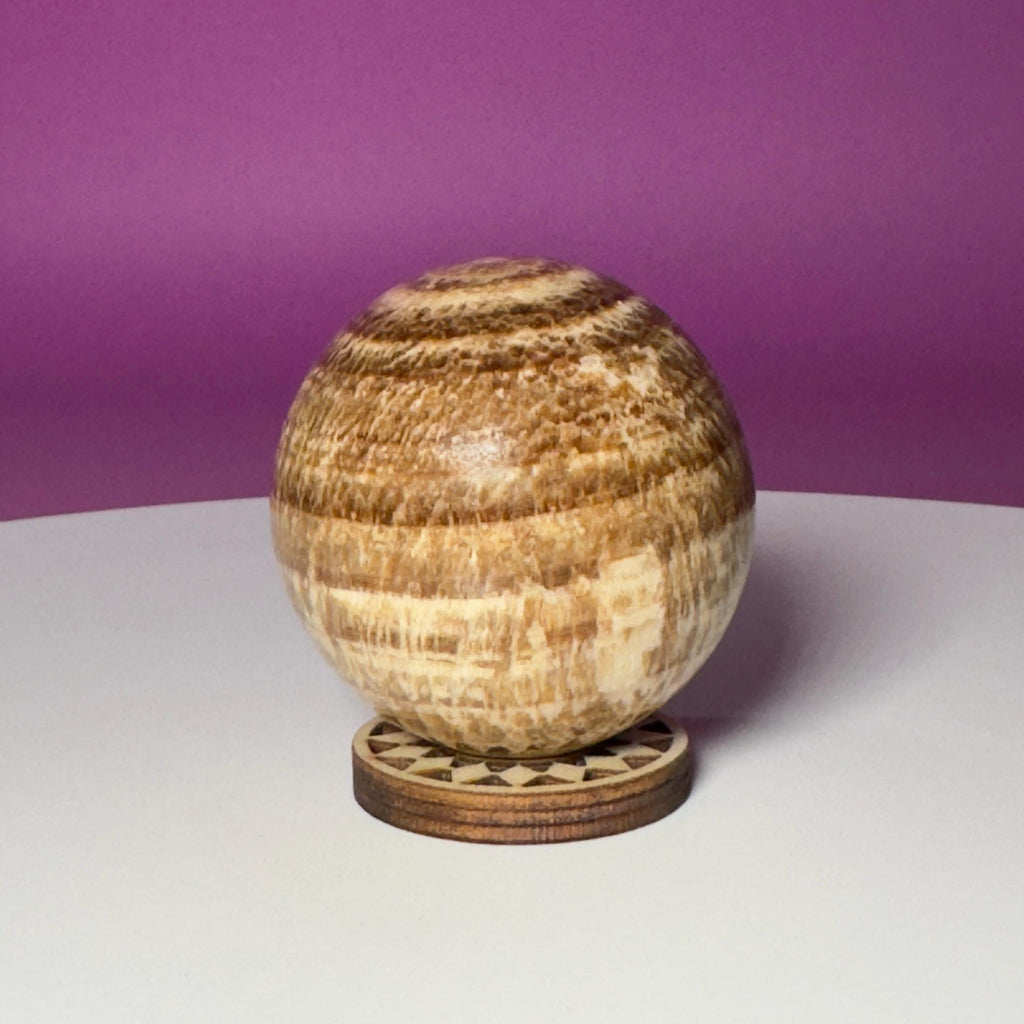 Peruvian Aragonite Sphere with Wood Stand