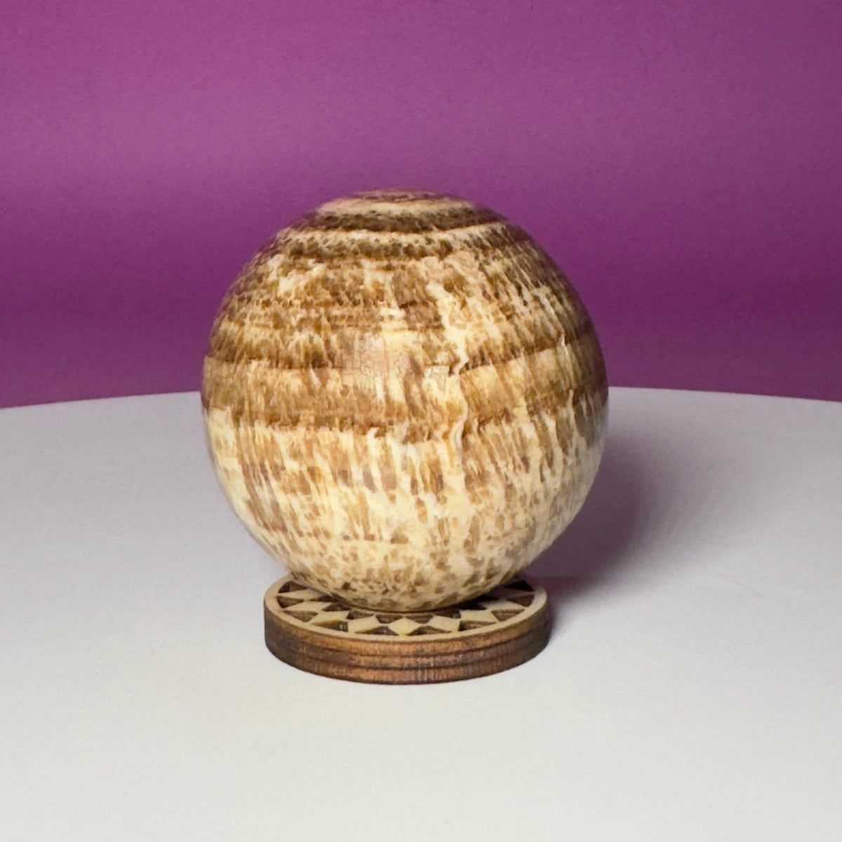 Peruvian Aragonite Sphere with Wood Stand