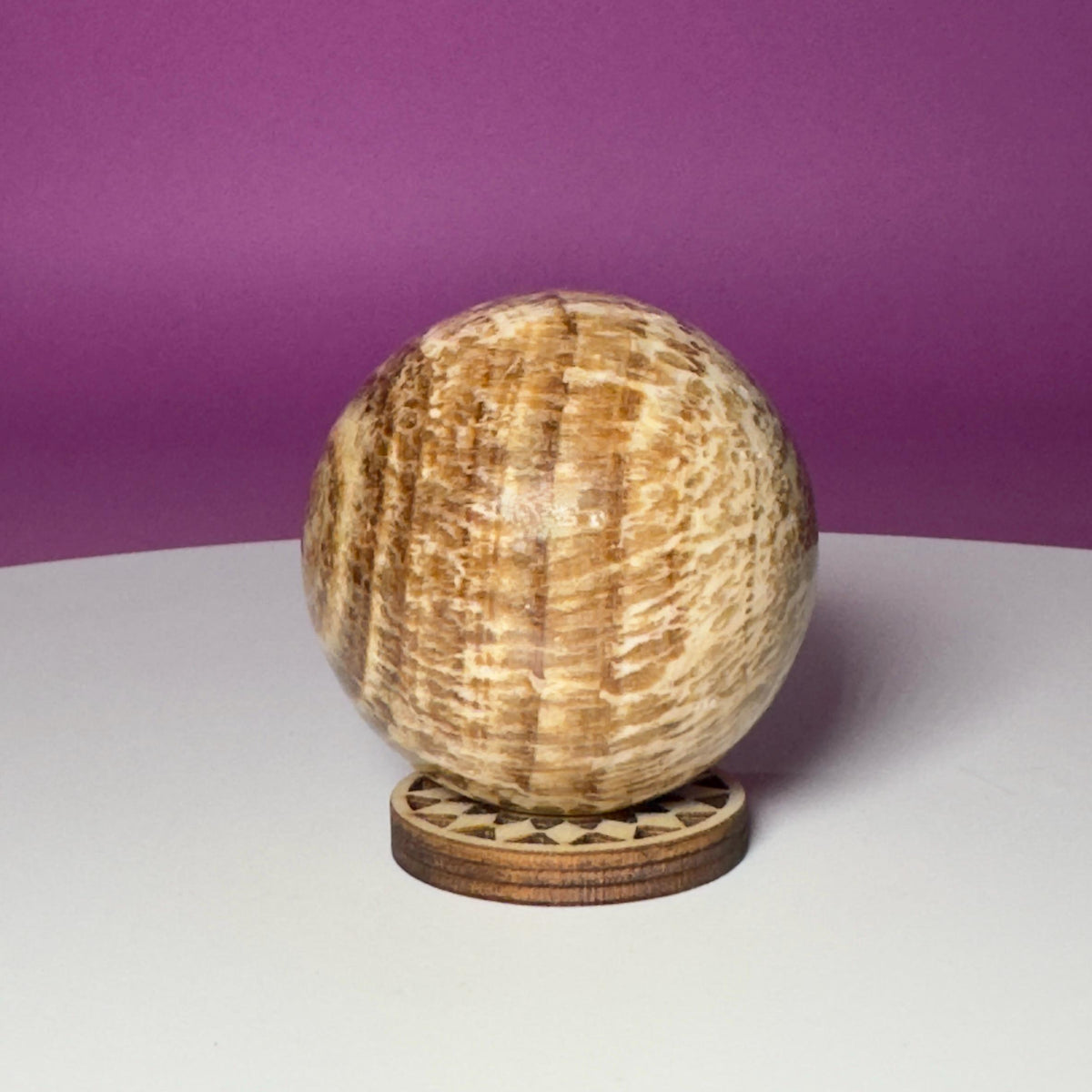 Peruvian Aragonite Sphere with Wood Stand