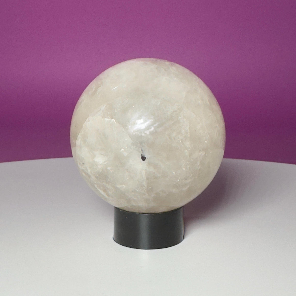 Tourmalinated Quartz Sphere on Black Acrylic Stand