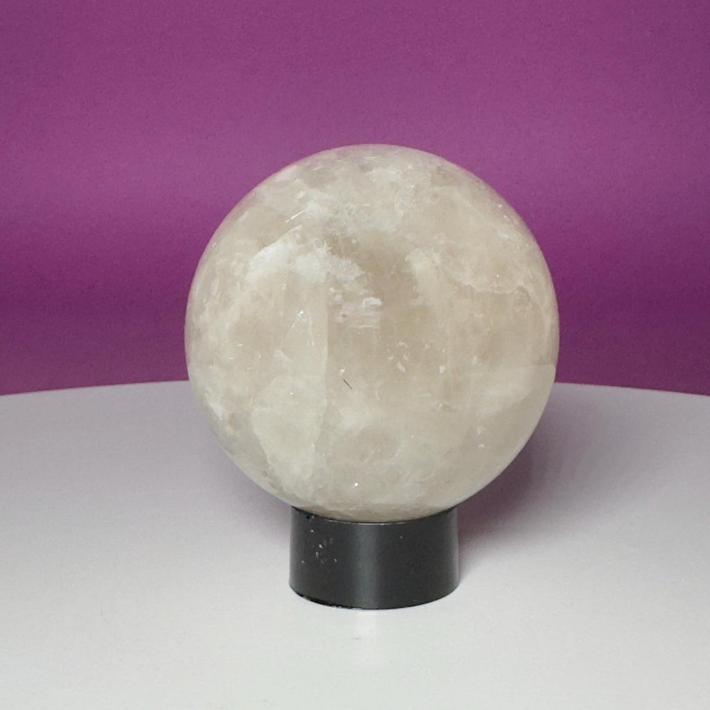 Tourmalinated Quartz Sphere on Black Acrylic Stand