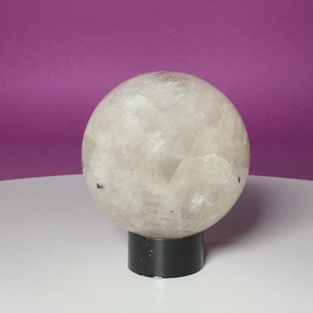 Tourmalinated Quartz Sphere on Black Acrylic Stand