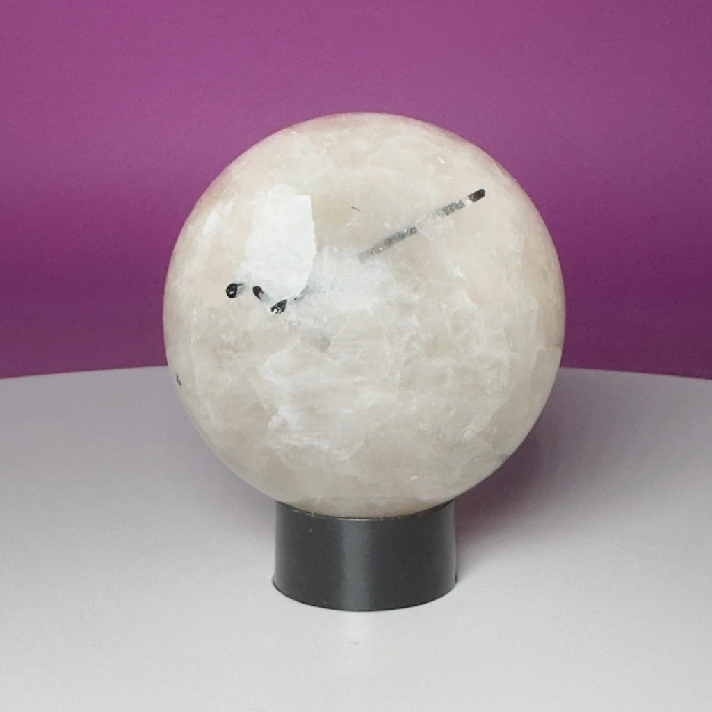Tourmalinated Quartz Sphere on Black Acrylic Stand