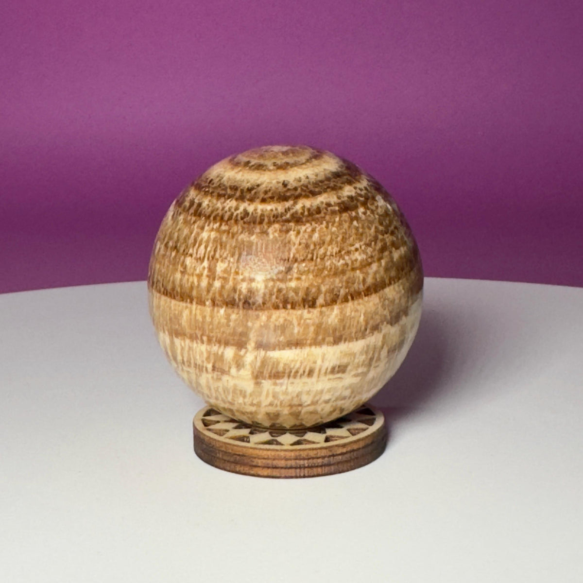 Peruvian Aragonite Sphere with Wood Stand